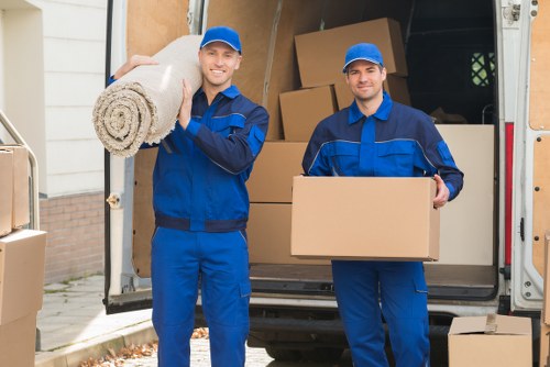 Office removals planning in Kentishtown with moving boxes and desks