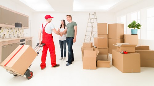 Preparing a removal truck for loading in a busy Kentishtown area