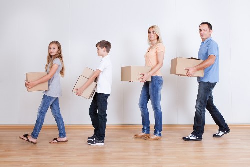 Prepared moving boxes and furniture for a Kentishtown collection