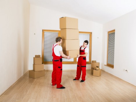 Commercial removals team relocating office furniture